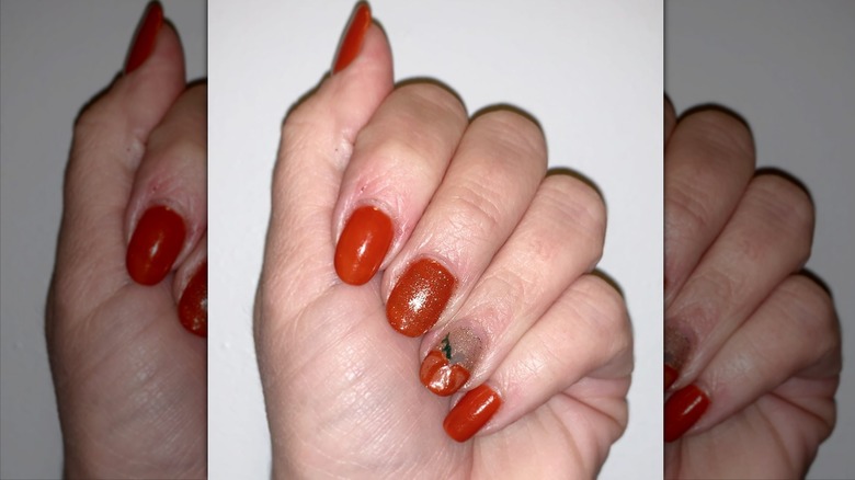 7. Glittery Pumpkin Nail Design - wide 6
