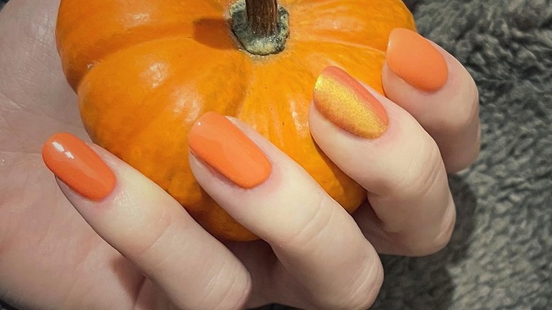 Pumpkin-orange nail colors