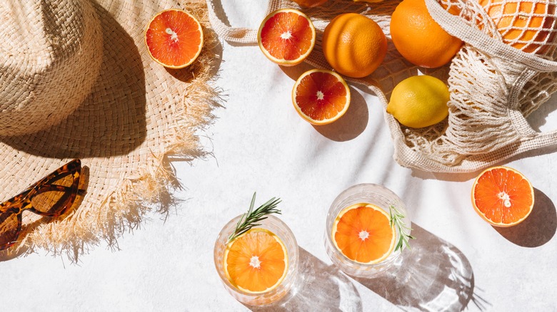 Summer still-life with citrus drinks