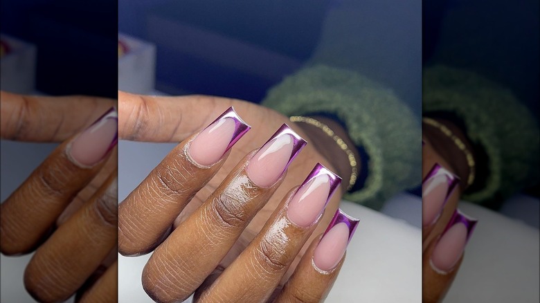 Woman with purple french tips