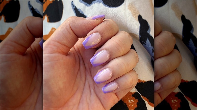 woman's hand purple chevron french manicure