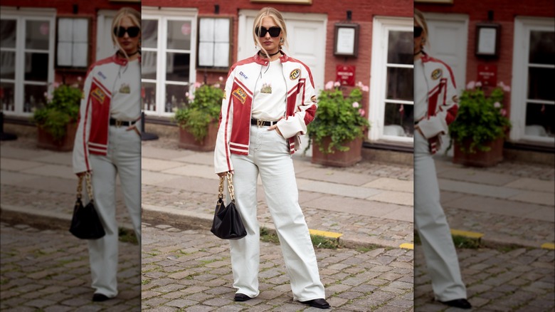 woman wearing red racing jacket