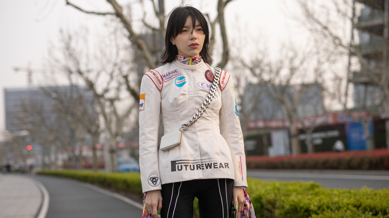 woman wearing racing jacket