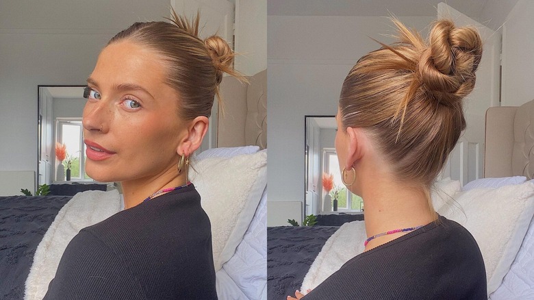 A woman with a spiky bun