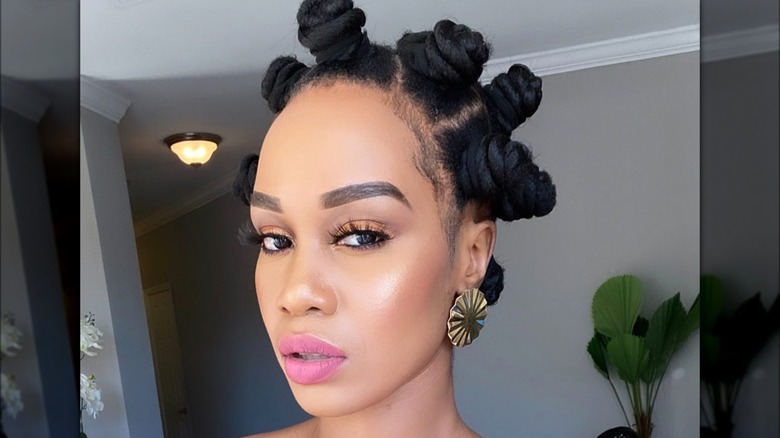 A woman with bantu knots