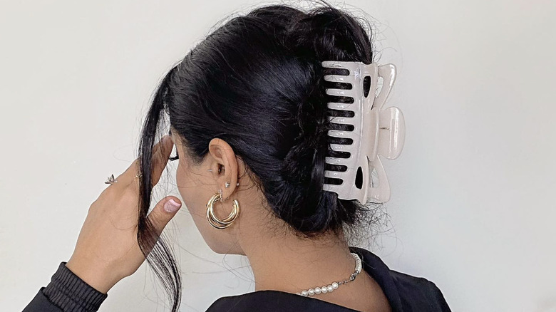 A woman with a hair clip