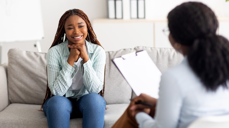 Woman in therapy session with doctor