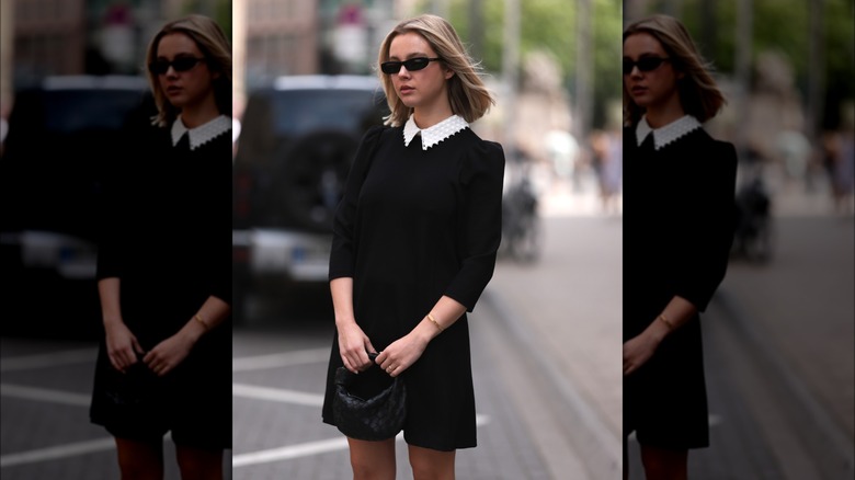 Isabelle Hartmann wearing black collared dress