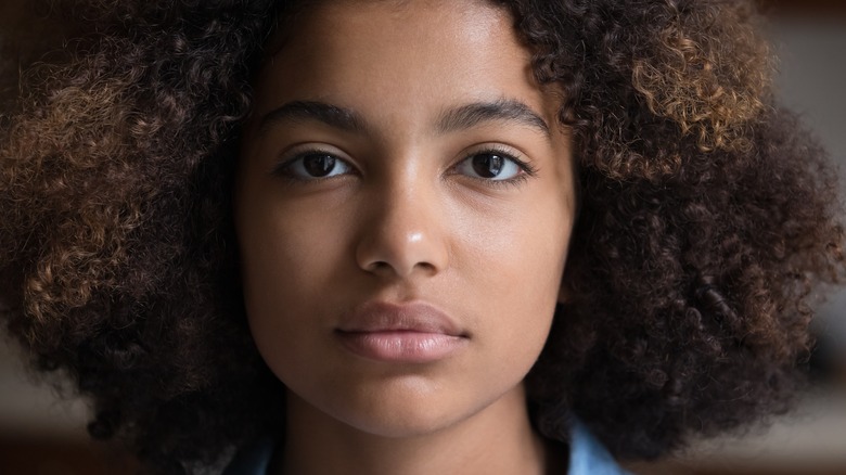 A woman with thick eyebrows