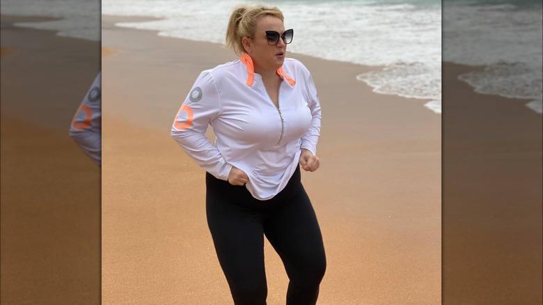 Rebel Wilson at beach jogging