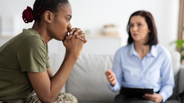military woman with therapist
