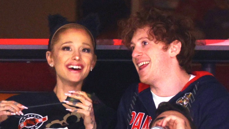 Ariana Grande and Ethan Slater at hockey game