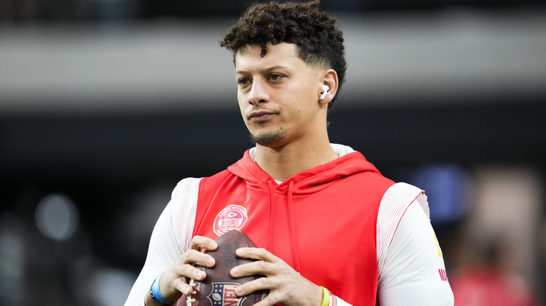 Patrick Mahomes holding a football