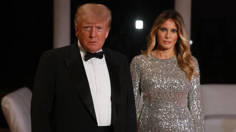 Melania in a glitter gown and Donald Trump in a suit