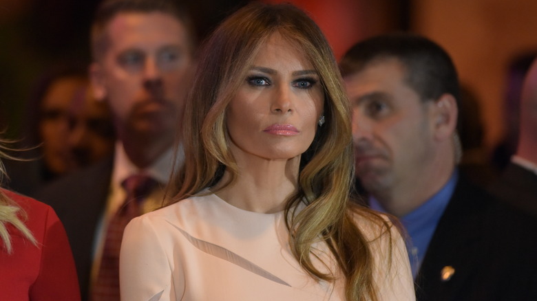 Melania and Donald Trump in a pink dress