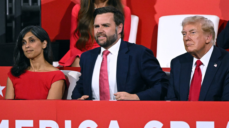 JD and Usha Vance sitting with Donald Trump.