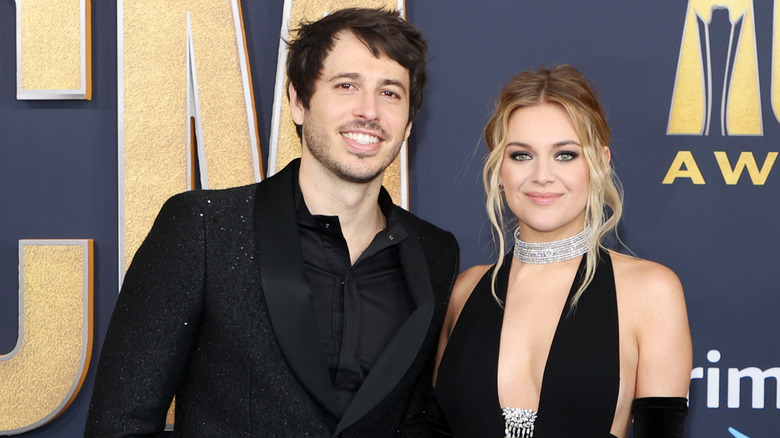 Kelsea Ballerini and Morgan Evans in black