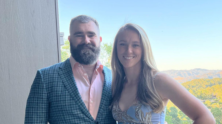 Jason and Kylie Kelce smiling while dressed up