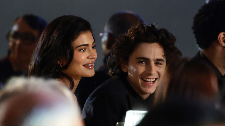 Kylie Jenner and Timothée Chalamet laughing together in 2023.