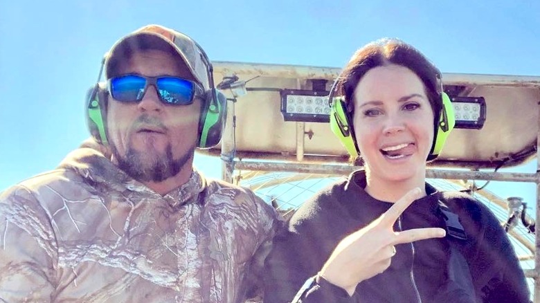 Lana Del Rey and Jeremy Dufrene on an airboat.