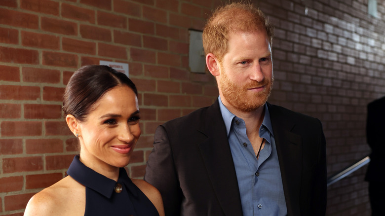 Meghan Markle and Prince Harry visiting a charter school.