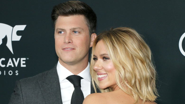 Colin Jost and Scarlett Johansson on the red carpet.