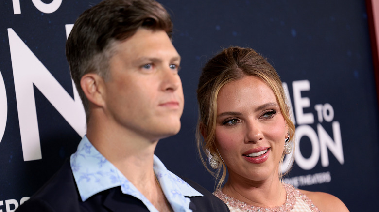 Colin Jost and Scarlett Johansson on the red carpet.