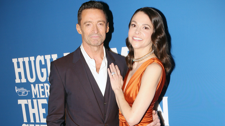 Sutton Foster and Hugh Jackman posing on a red carpet together.