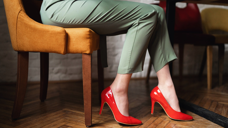 Woman wearing red stilettos