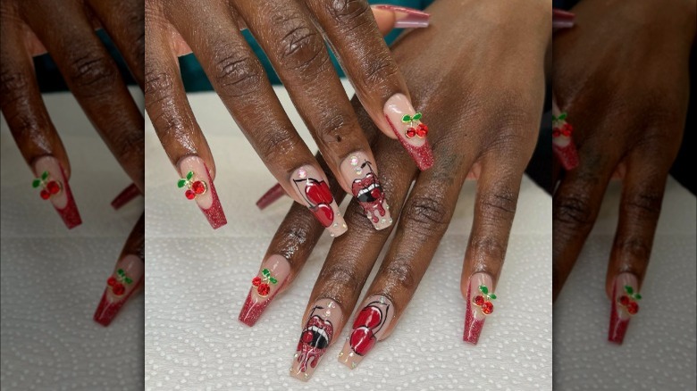 Red nails with cherry design