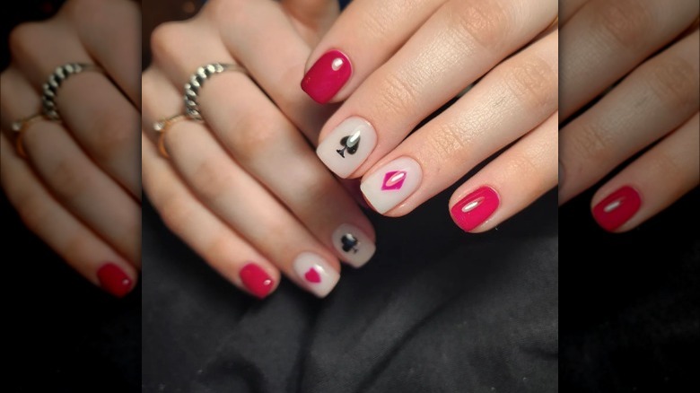 Red nails with card accent