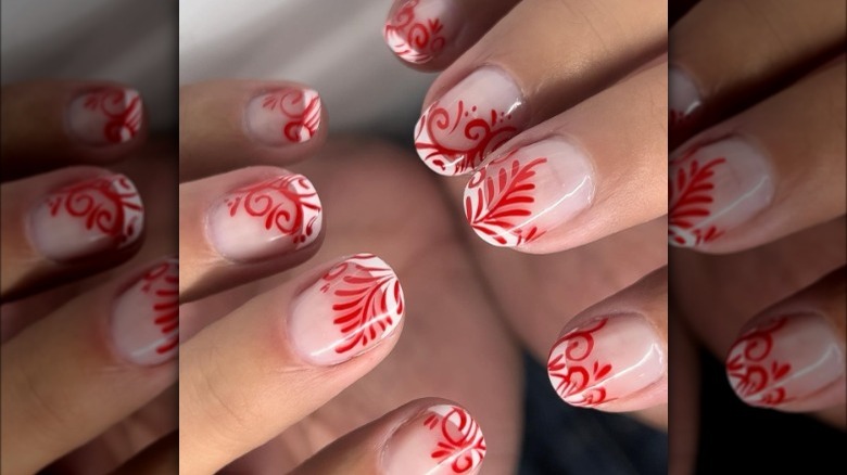 White French manicure with red doodles