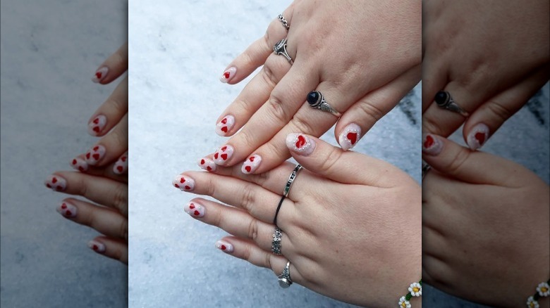 Nails with red hearts