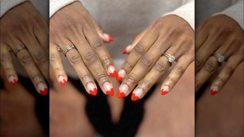 Red heart French tip nails