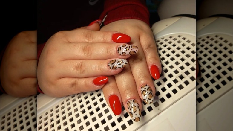 Leopard print and red nails