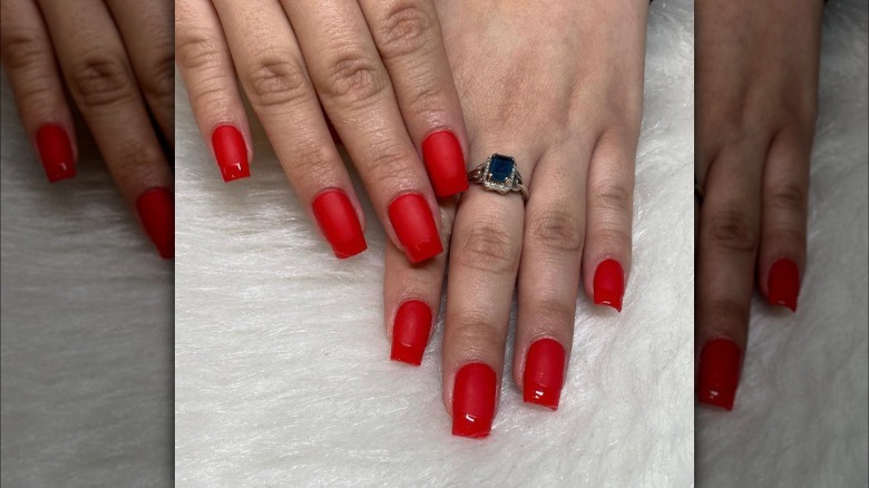 Matte red nails with glossy tips