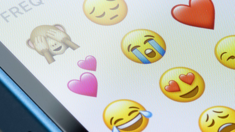 Phone screen with emoji selection