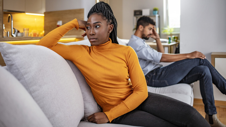 couple facing away from each other