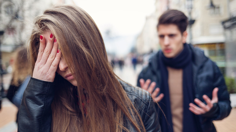 couple arguing in public