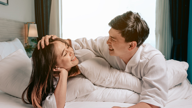 couple talking in bed