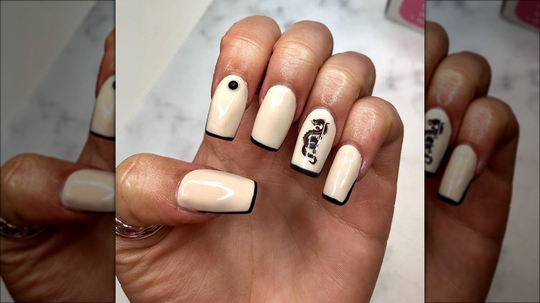 Woman with nail stickers