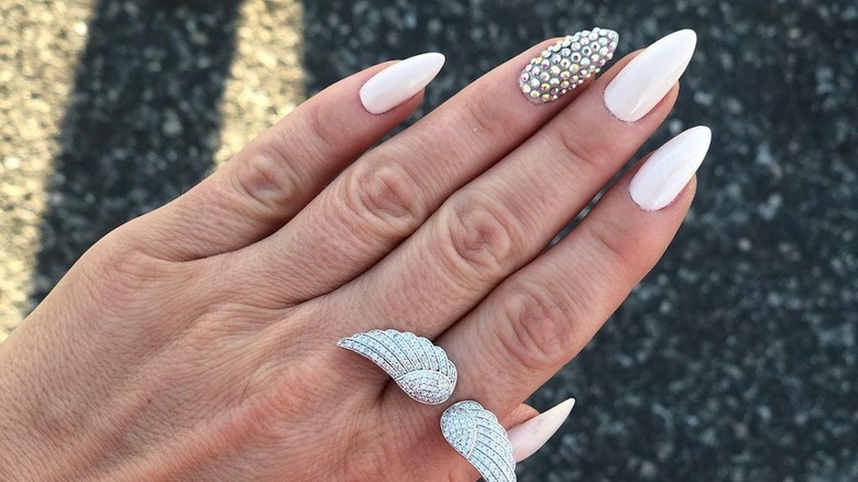 Woman with rhinestone nails