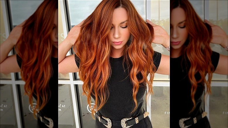 woman with copper reverse balayage hair