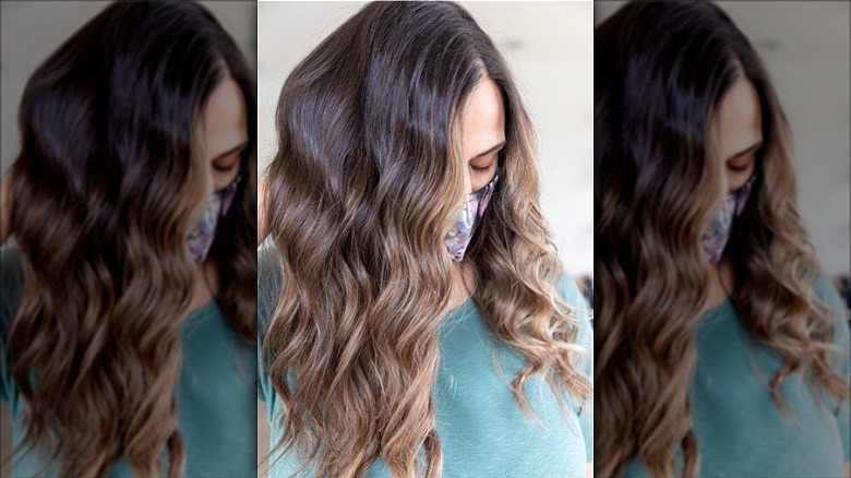 woman with brown reverse balayage hair