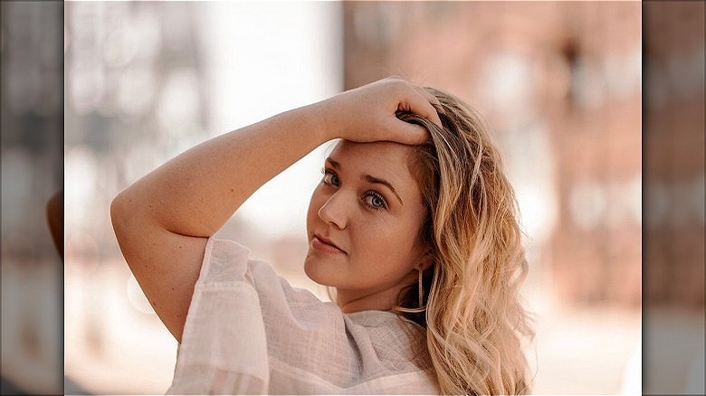 woman with blonde reverse balayage hair