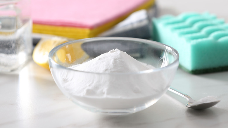 Baking soda and cleaning supplies