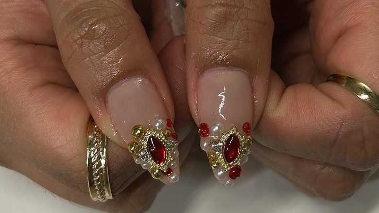 thumbs with ruby-like rhinestones