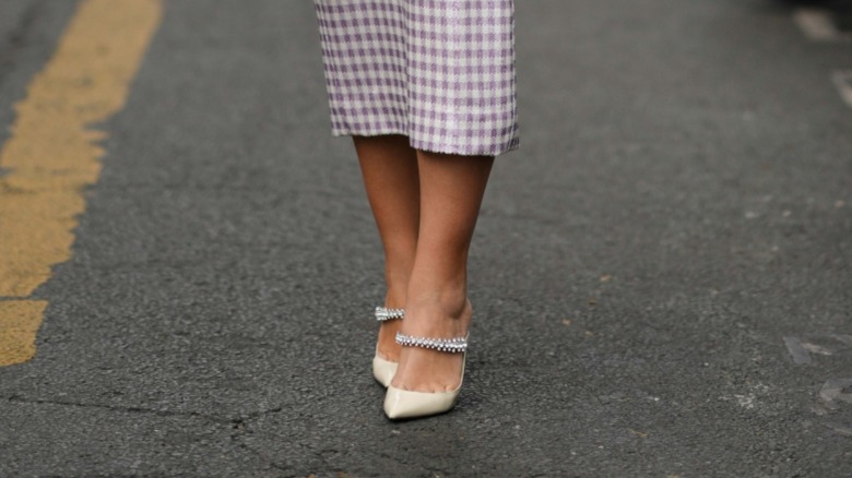 woman wearing rhinestone heels 