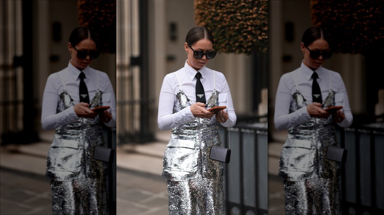 woman wearing silver sequined dress