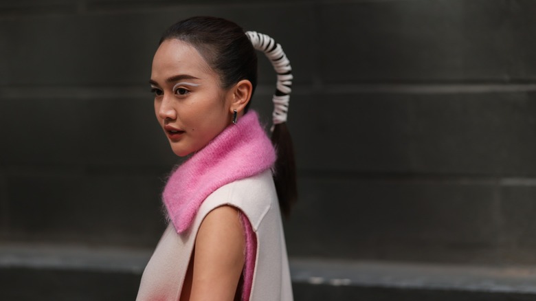 Woman with ribbon in hair